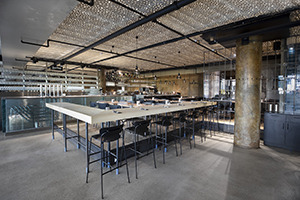  Taproom of the Brambory restaurant seating 15 guests at the bar.