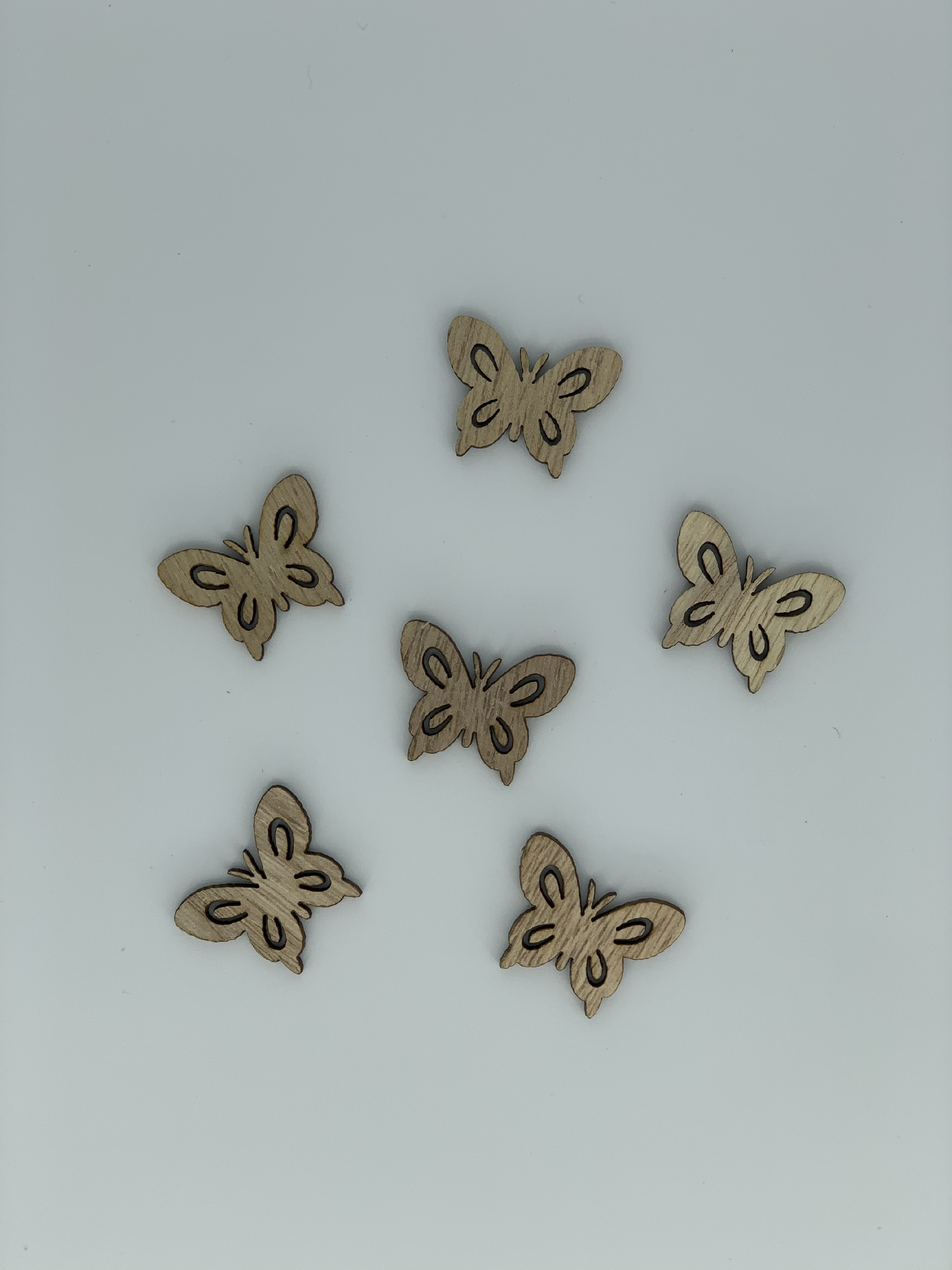 Jarní motýlek dřevěný hnědý v. 27 mm