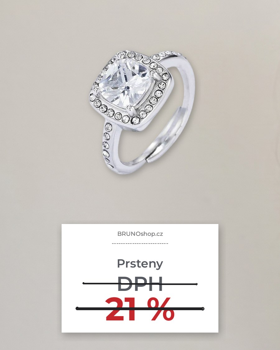 Prsten s kamínkem na světlé stěně a účtenka s přeškrtnutým DPH 21 %