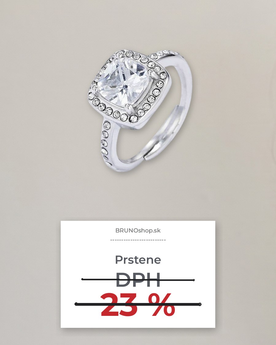 Prsteň s kamienkom na svetlej stene a účtenka s prečiarknutým DPH 23 %