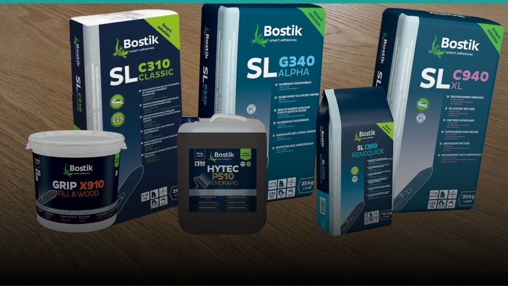 Detailní záběr na balení nivelačních stěrek a penetrací