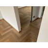 Ukazka realizace podlahy bez prechodovych list Herringbone Dub Classic