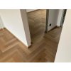 Ukazka realizace podlahy bez prechodovych list Herringbone Dub Classic