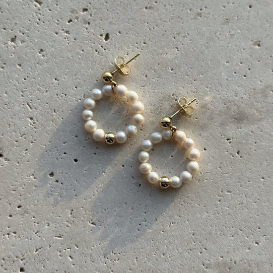 Pearl karma earrings