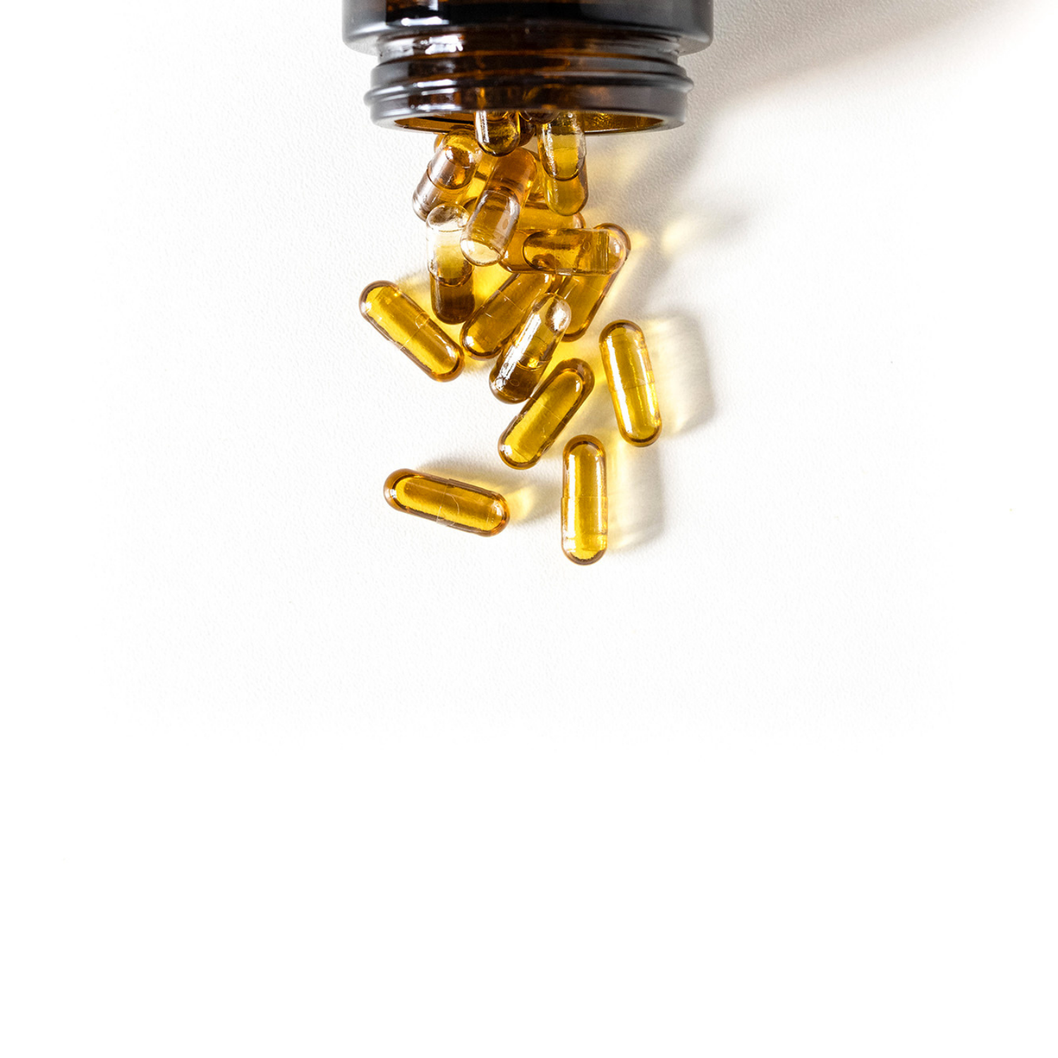 CBD CBG kapsle bile pozadi