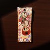 Japonský přívěsek na klíče Daruma