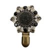 Brooch with Black Floral Ornament