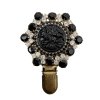 Brooch with Black Floral Motif