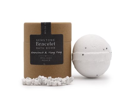 Čelní pohled na krabičku , šumivou kouly do koupele a náramek z drahého kamene