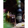 Fentimans Curiosity Cola – lahev a sklenice s ledem a citronem