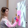 magnetic projector screen writable wallcovering in workspace