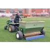 man spreading sand on a 54D spreader 1 768x512.png