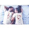 back and front sides of t shirts mockup being worn by a happy couple resting on bed a20604