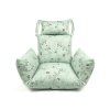 Scaun tip cocon KOKON alb cu suport și pernă verde deschis cu model modern
