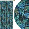 zatemnovaci-zaves-jungle-breeze-intenzivne-modre-a-zelene-tropicke-listy-na-tmavomodrom-podklade-cooldesign