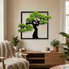 Machový obraz bonsai v čiernom ráme ako dekorácia v interiéri obývačky