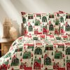 Flanelové vianočné obliečky s motívom domčekov v červeno-zelenej farebnej palete – hrejivý zimný doplnok do spálne