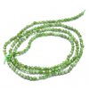 Faceted diopside, 2 mm