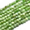 Faceted diopside, 2 mm