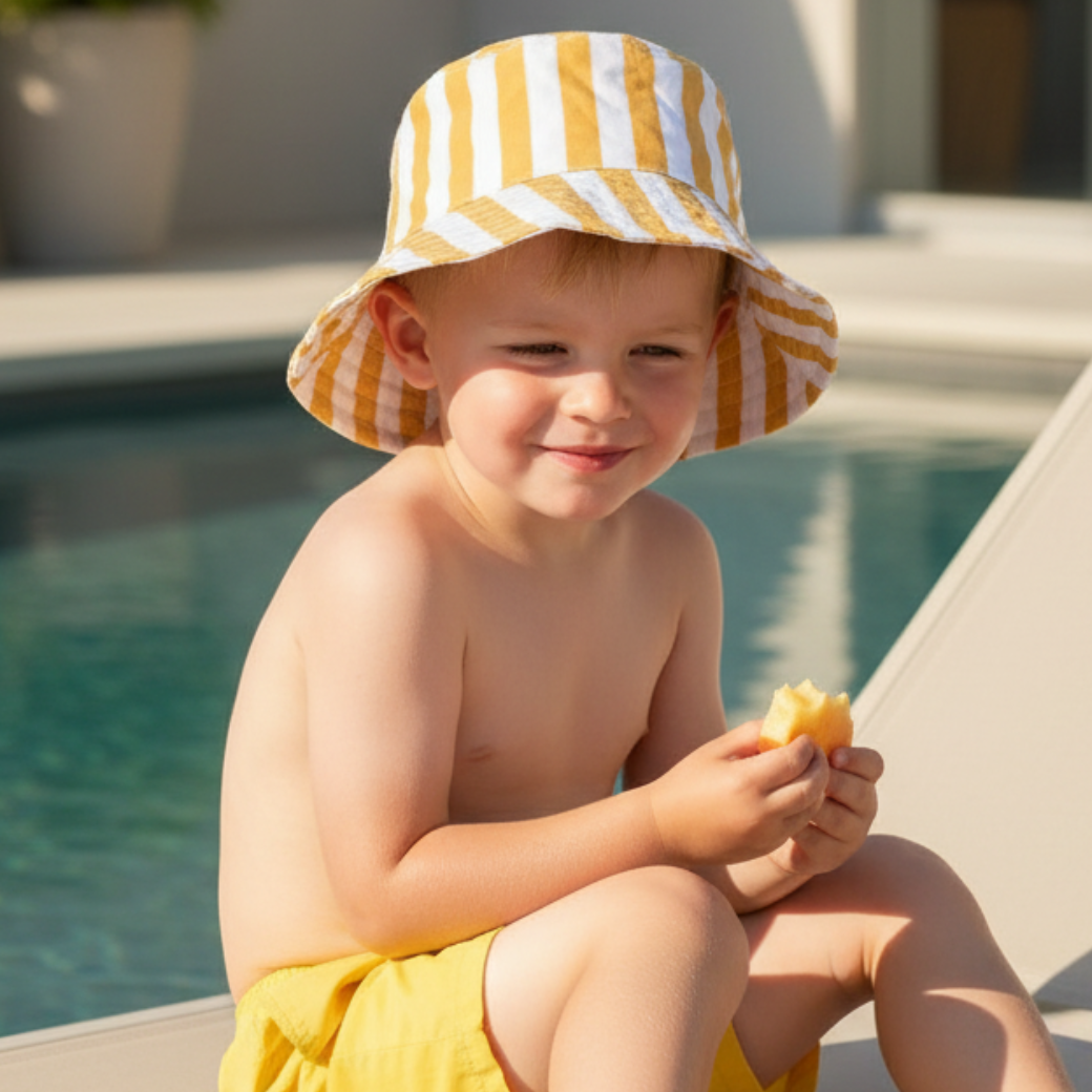 LIEWOOD Klobouk Matty - Stripe Yellow mellow/White Velikost: 3-4y