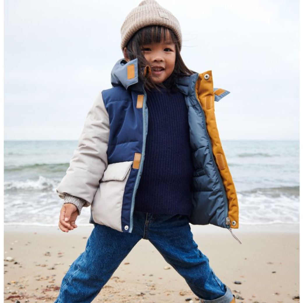 LIEWOOD Oboustranná bunda Paloma - Whale blue multi mix Velikost: 4y