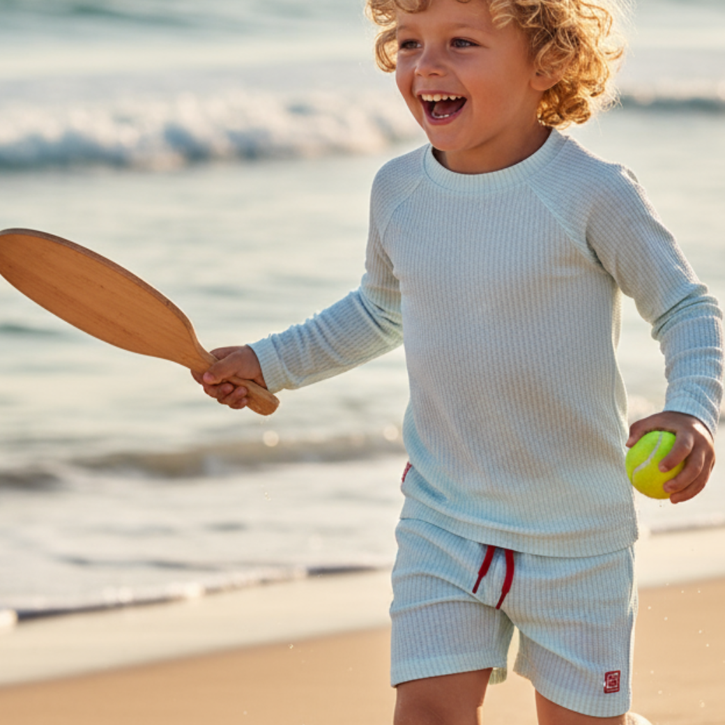 LIEWOOD Plavecké triko Noah - stripe Pure sky / Creme de la creme Velikost: 110