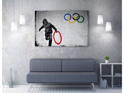Obraz na plátně (50 x 70) Banksy Street Art – Olympijské kruhy
