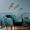 Nástěnná dekorace FLYING SEAGULLS  zlatí racci