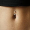Zdobený visací piercing do pupíku Elcrossa s křížkěm