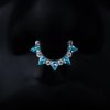 Zdobený titanový piercing Sky zdobený modrým a čirým zirkonem