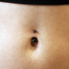 Titanový piercing do pupíku BlackSpade s černým zirkonem.