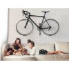 Držák na kolo do interiéru na zeď Super Hero obývák