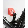 Držák na kolo do interiéru na zeď za pedál Super Hero červený