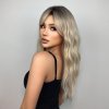 Dlouhá platinová blond vlnitá paruka Denisa s jemným přechodem