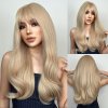 Platinově blond dlouhá vlnitá paruka Aurelia s jemnou ofinou