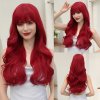 Ohnivě červená dlouhá paruka Johana s plnou ofinou