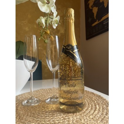 sampanske so zlatom s napisom