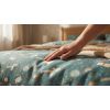 gemini image 2 Photorealistic close up of bedding with a soft touch interaction. A human hand g 1