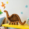 Dřevěná pokladnička dinosaurus