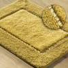 Mäkký a výrazný koberec zdobený kryštálmi 75 cm x 150 cm horčicová