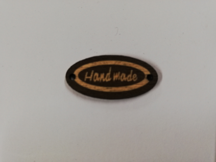 Dřevěný výřez oválek s nápisem "Hand Made"