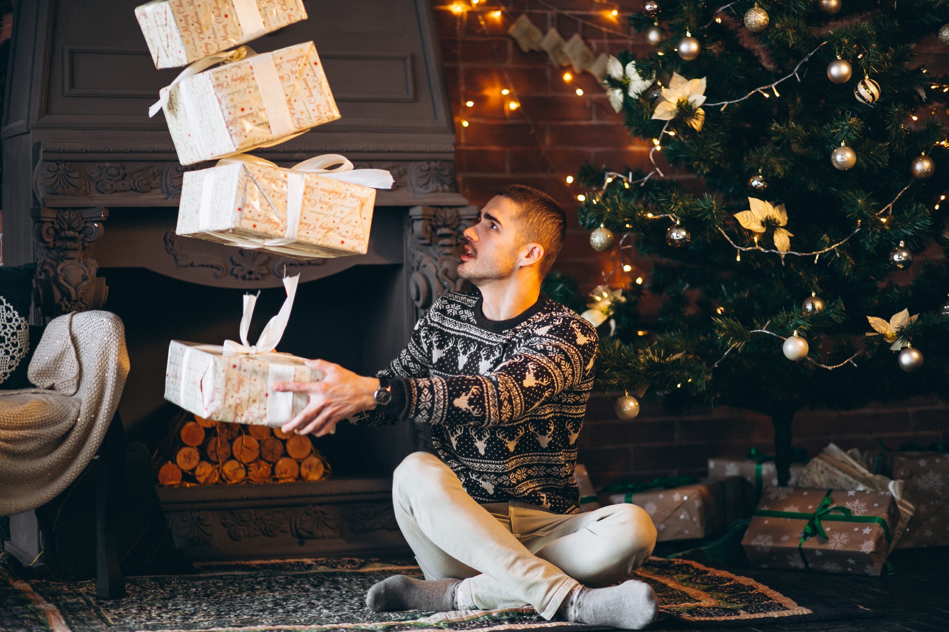 handsome-man-holding-christmas-peresents