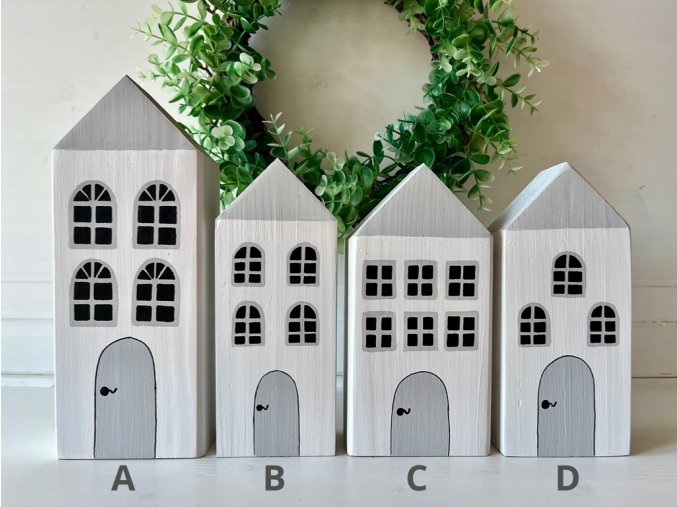 Dřevěné bílé domečky s šedou střechou