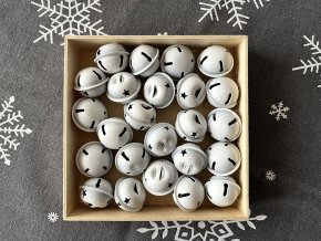 Bílá kovová rolnička