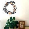 Dřevěný věnec originální dekorace do interiéru