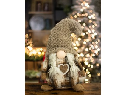 Vánoční skřítek s hnědou čepicí holčička