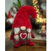 Vánoční skřítek s červenou čepicí holčička