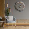 390453 2 nastenne kovove hodiny v modernom style 60 cm hnede