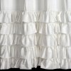 Luxusný záves CARLI na pásku s volánikmi a trblietavým pásom kryštálov - biely