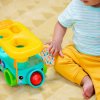 BRIGHT STARTS BRIGHT STARTS Autíčko vkládací s míčky Pop & Roll Safari Bus™ 6m+